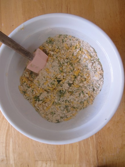 Add shredded cheese and mix with a spatula or a wooden spoon.
