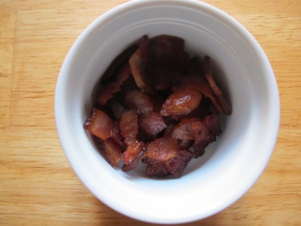 We like our meat to be organic and that costs quite a bit.  Our solution?  We buy very little meat and when we do cook with it, we use morsels.  So bacon is kept frozen in our house and when needed for a stew or something like this, I just cut a few slices widthwise.  This way we always enjoy quality meat and in moderation.  It works for our family-- make huge holiday meals a well celebrated occasion.  What do I tell the kids?  We eat to live, we don't live to eat.