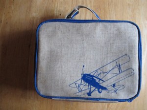 Lunchbox is designed by Soy Young.  So far, so good-- easy to clean if you keep the foil insert inside.  Wish the handle wasn't velcro, just a clasp would suffice.